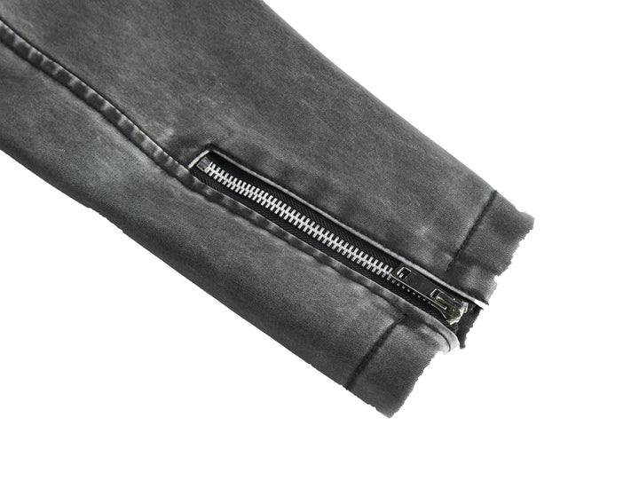 Back view of a women's gray faux leather moto jacket, highlighting the tailored fit and versatile style.