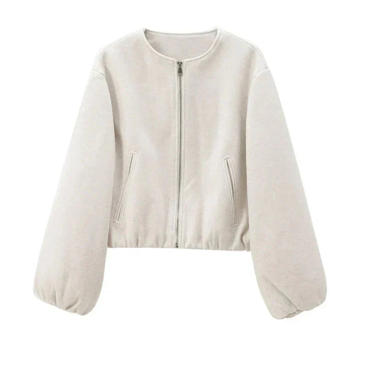 Beige women's cropped zip-up sweater, a versatile polyester top for casual fall fashion.