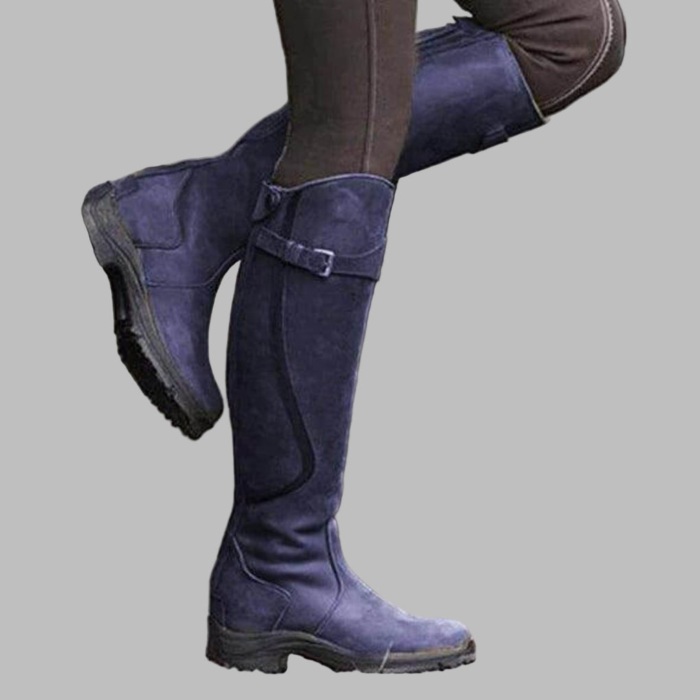 Stylish ladies' riding boots with advanced grip-tread soles, providing stability & comfort for equestrian sports.