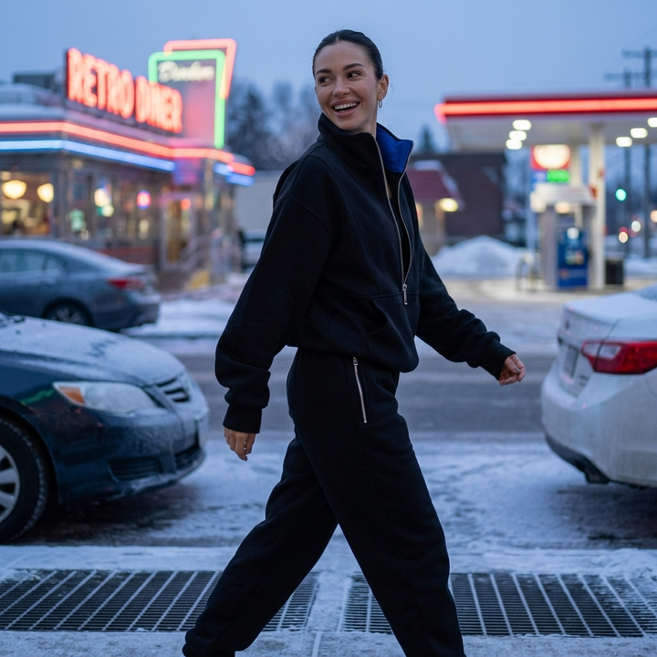 Cozy women's athleisure half-zip pullover top. Soft fabric, perfect for comfort, travel, or everyday casual wear.