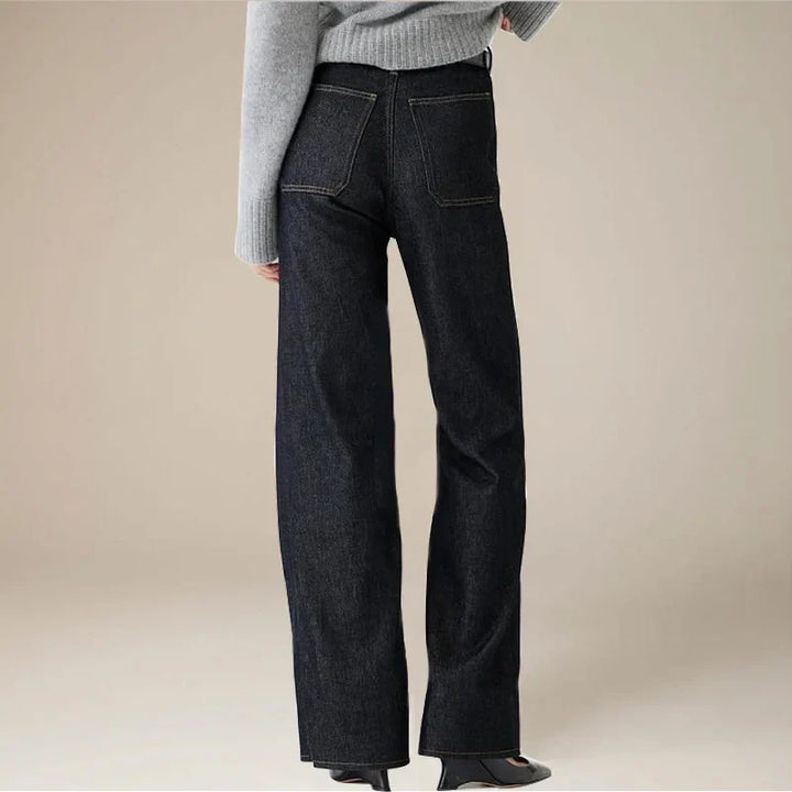 Back view of women's high-waist capri denim trousers, flattering fit, summer pants
