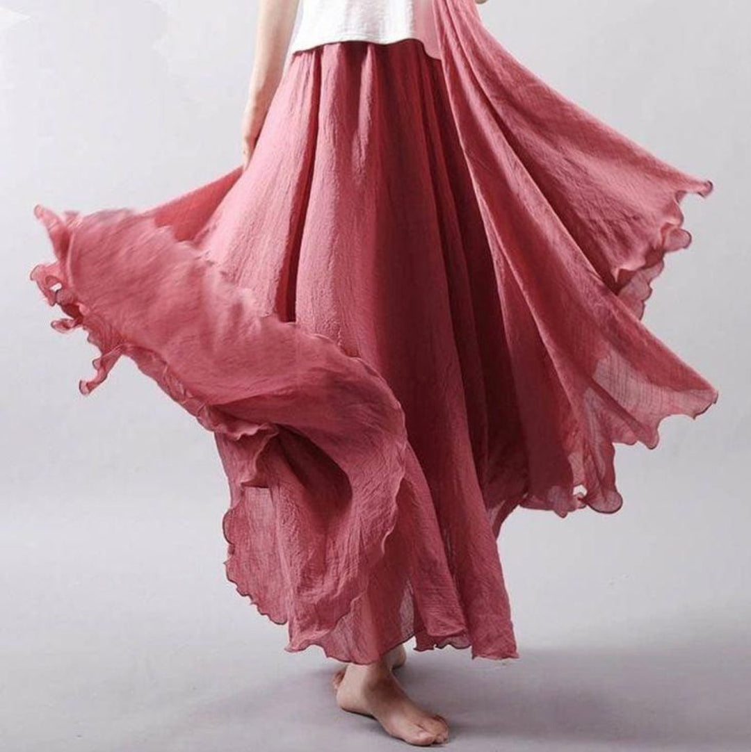 Elegant bohemian maxi skirt for women, high waist A-line design, comfortable & flowing for vacation & beach.