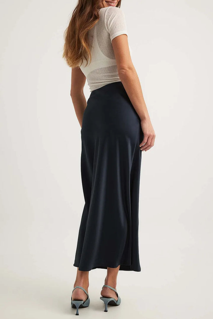 Elegant women's flowing midi skirt, high-waist satin perfect for party wear.