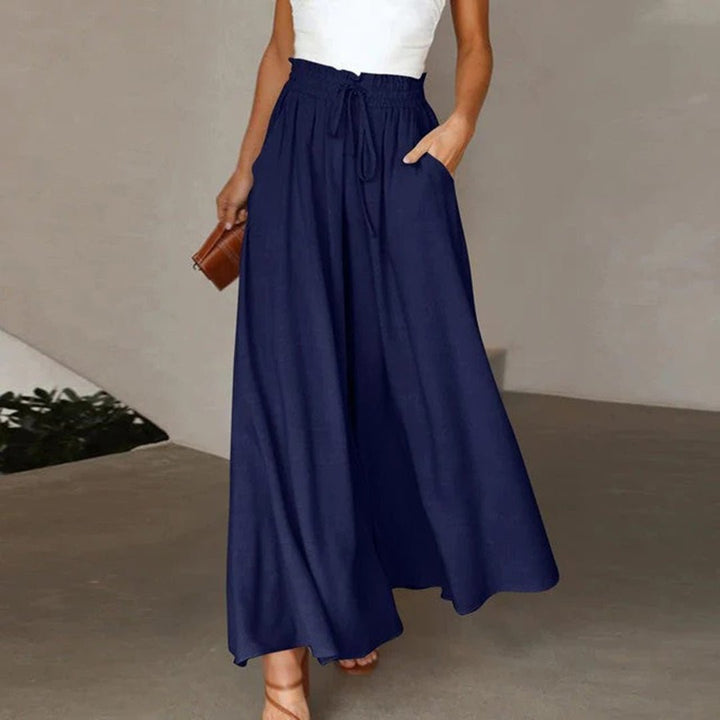 Women's high waist wide leg pants with drawstring & pockets, flowy for casual summer comfort.