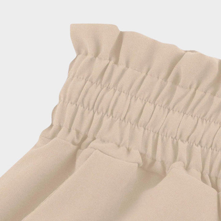 Women's high waist wide leg drawstring pants with side pockets, offering a relaxed, flowy fit for summer.