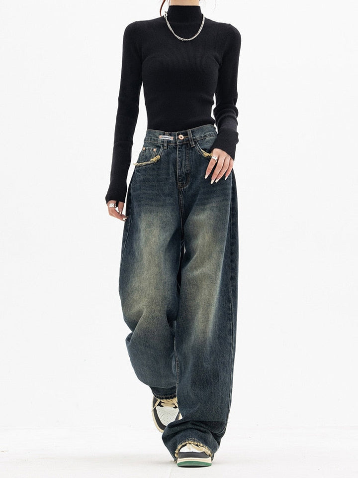 Casual women's high-waisted jeans, wide-leg style in blue denim, perfect for spring
