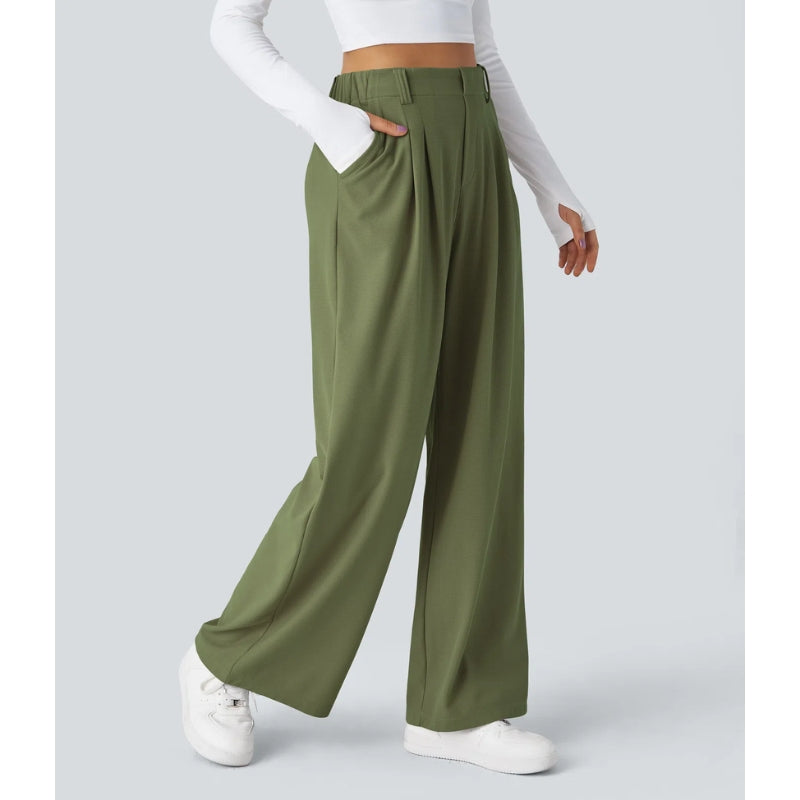 Stack of folded women's waffle knit wide leg high waisted pants in various casual colors