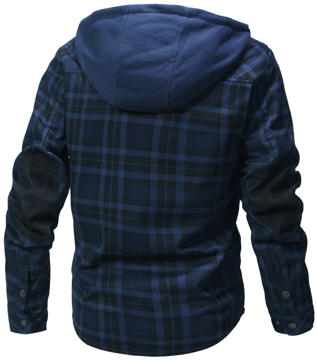 Lifestyle image of a woman walking in a park, wearing a durable hooded flannel faux fur jacket