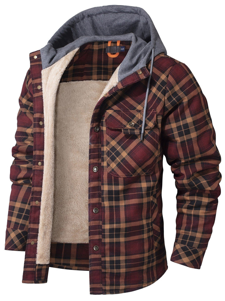 Full shot of a woman wearing a red and black plaid hooded flannel jacket with faux fur, styled casually