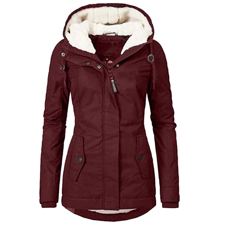 Close-up of women's fur-lined hood on an insulated winter parka, cozy and warm.