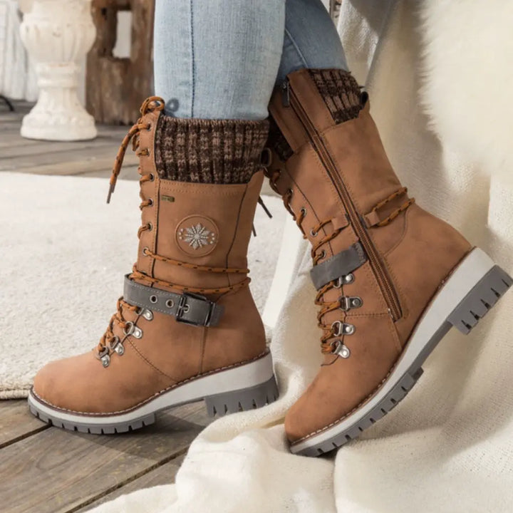 Front view of women's insulated waterproof snow boots, ideal for harsh winter