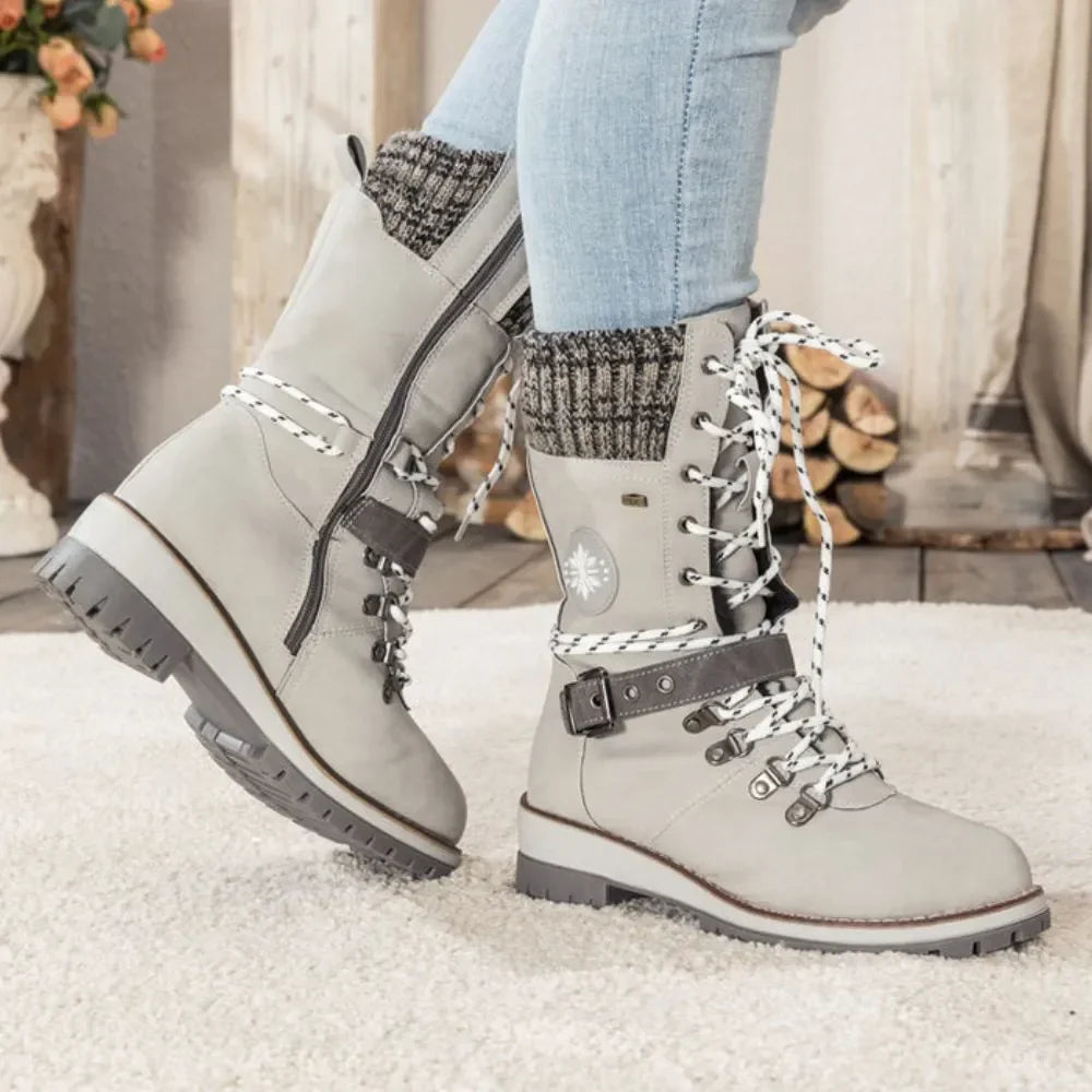 Women's waterproof winter boots, insulated design for warmth, snowy background