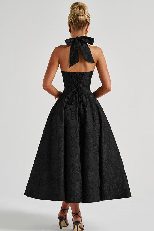 Sophisticated women's jacquard tea-length A-line dress, ideal for homecoming, with halterneck.