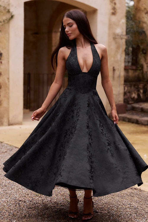 Formal women's halterneck tea-length dress in jacquard, a stunning choice for parties.