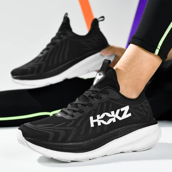 Stylish women's athletic shoes, lace-up design, and modern chunky sole for comfortable running and versatile wear.