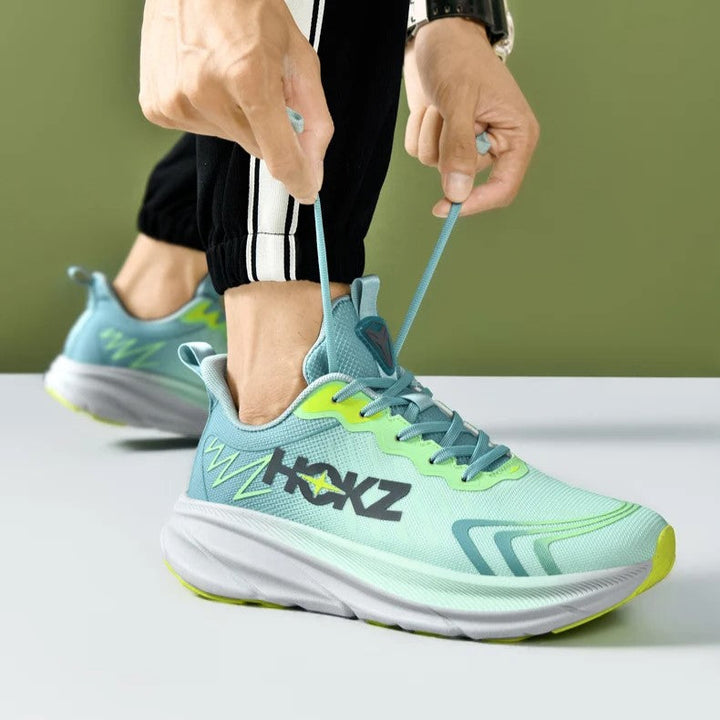 Chunky sole women's athletic sneakers, lace-up closure for secure fit. Comfortable performance running and training shoes.