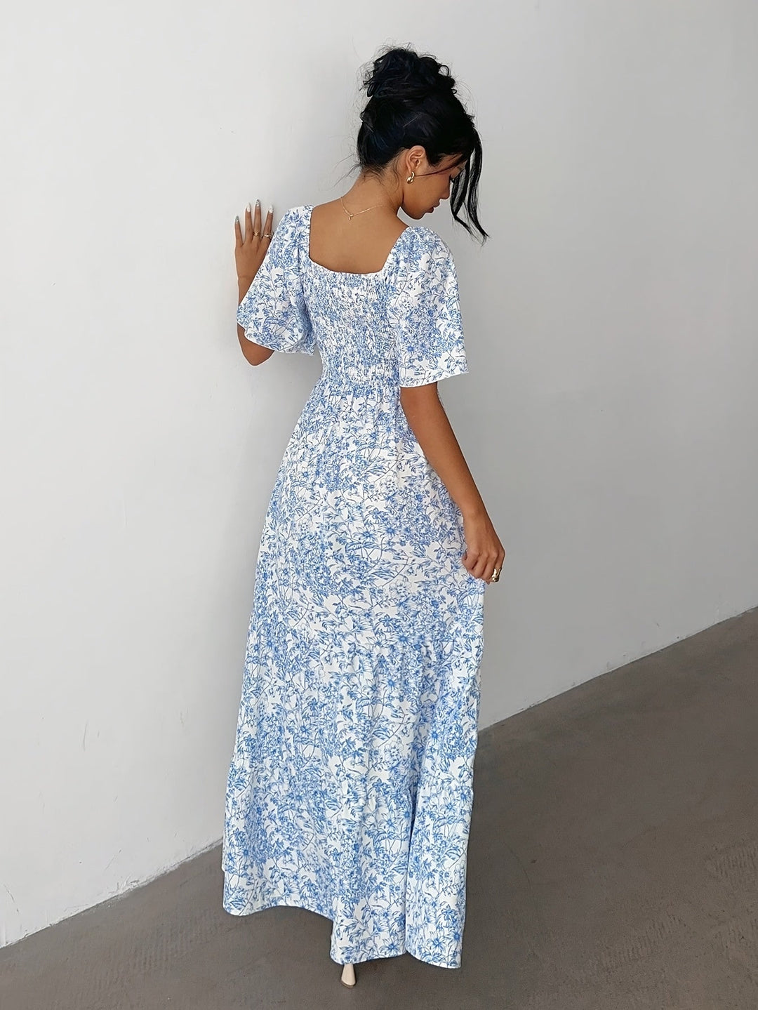 Sweetheart tiered floral maxi dress for women in light blue, a flowing and comfortable choice for summer outings.