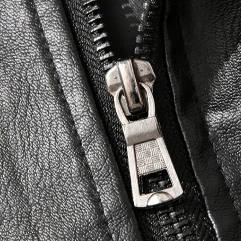 Women's black moto jacket made from vegan leather, ideal for a chic fall look