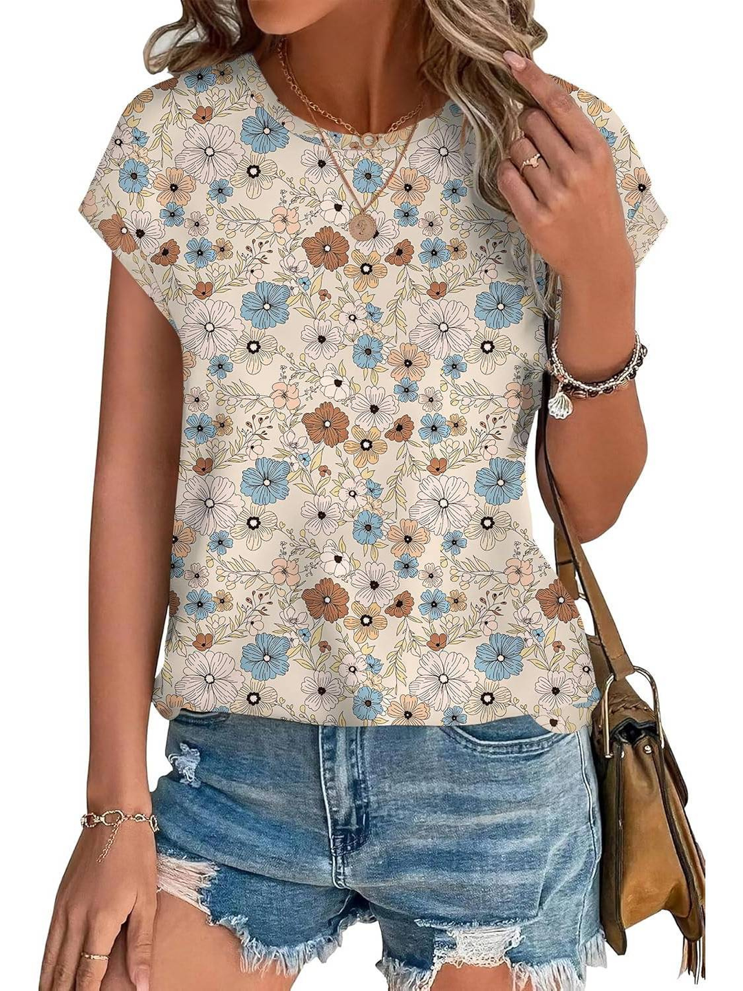 Flaunt this lightweight women's cap sleeve top with a vibrant botanical leaf print this summer.
