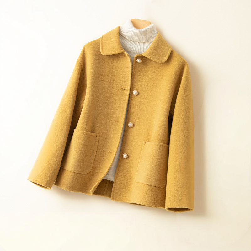 Women's lightweight cashmere knit button jacket in classic black, front view, casual luxury outerwear