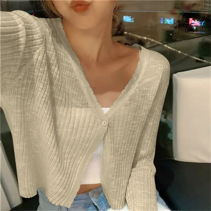 Lightweight women's cropped button-front v-neck cardigan, long sleeve, for effortless layering.