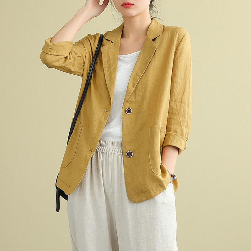 Chic women's tailored linen blazer. Versatile lightweight jacket with pockets for everyday spring/summer style.