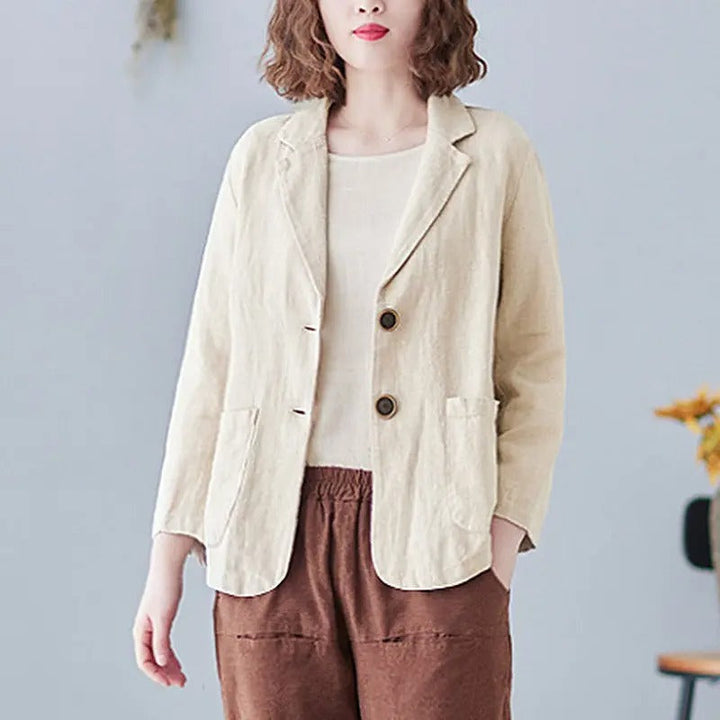 Women's professional linen blazer. Tailored fit, lightweight, with practical pockets for versatile business wear.
