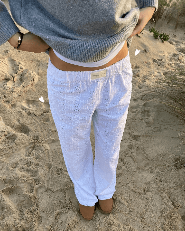 Women's comfortable lounge trousers, soft lightweight fabric, relaxed fit, and elastic waist for effortless casual style.