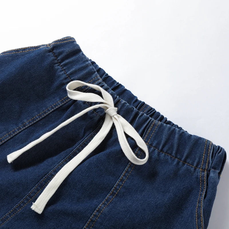 Women's lightweight denim two-piece set, styled with accessories for a complete summer outfit