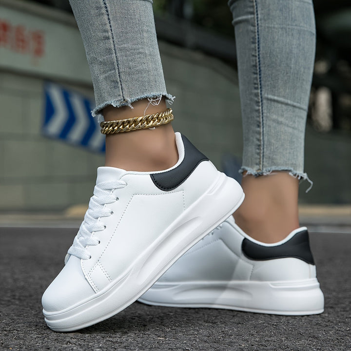 Close-up: Breathable mesh on women's lightweight orthopedic sneakers for ultimate comfort & ventilation.