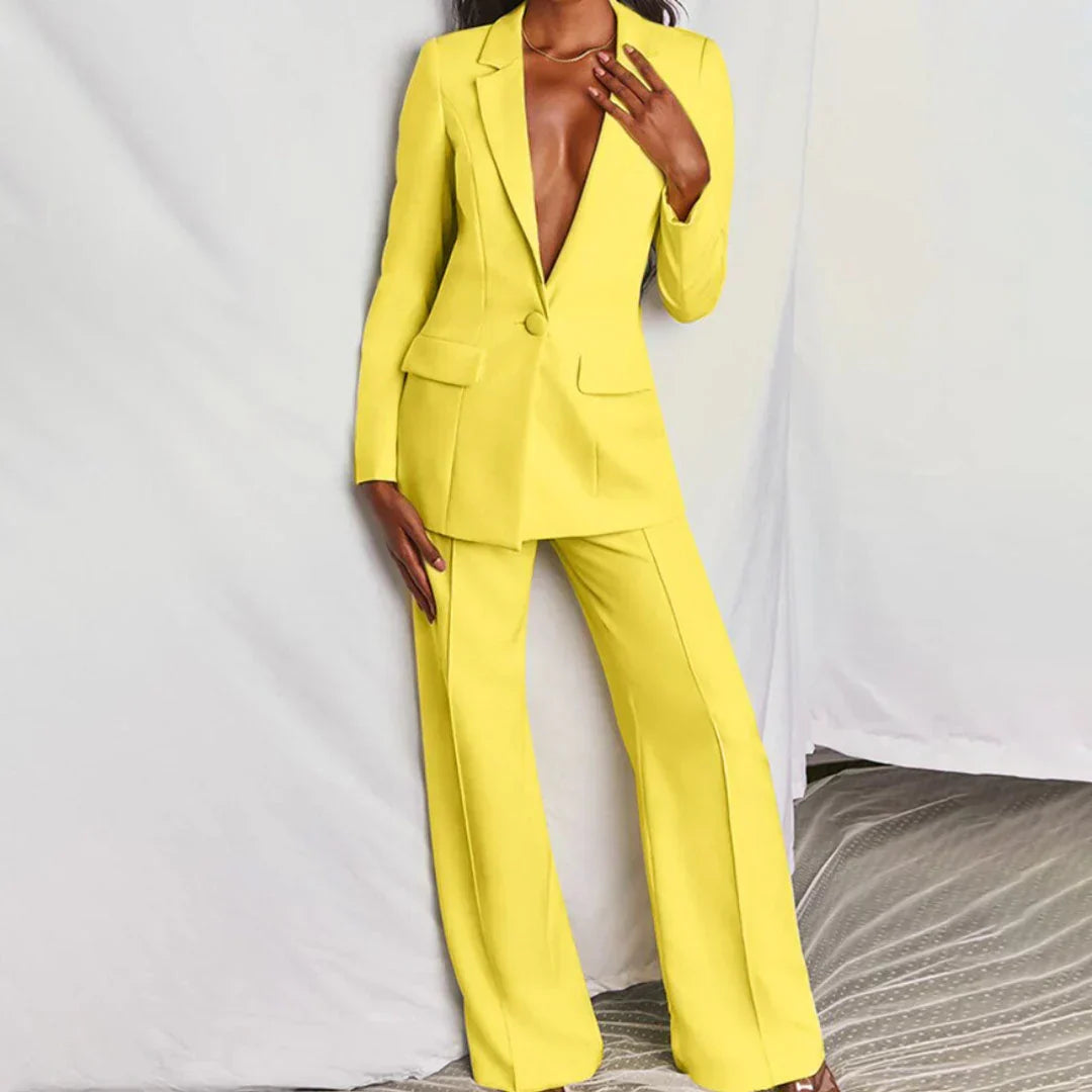 Women's longline blazer and wide-leg pants suit. Chic, tailored, perfect for professional wear.