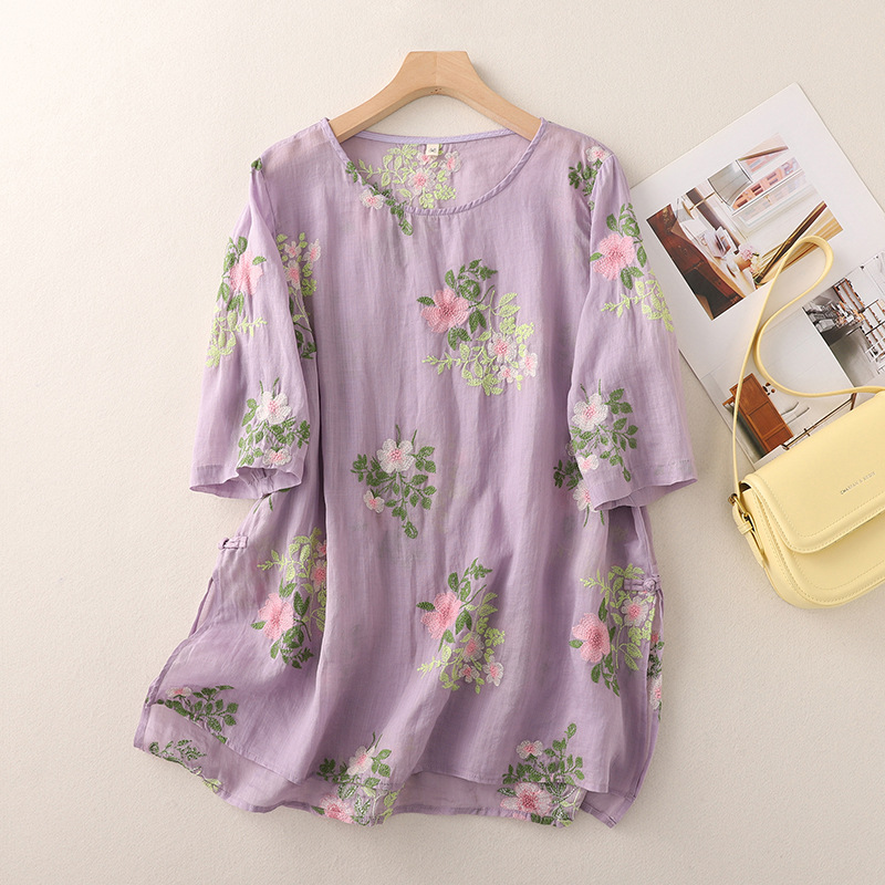 Women's loose fit blouse with delicate floral embroidery, ideal for elegant summer casual wear
