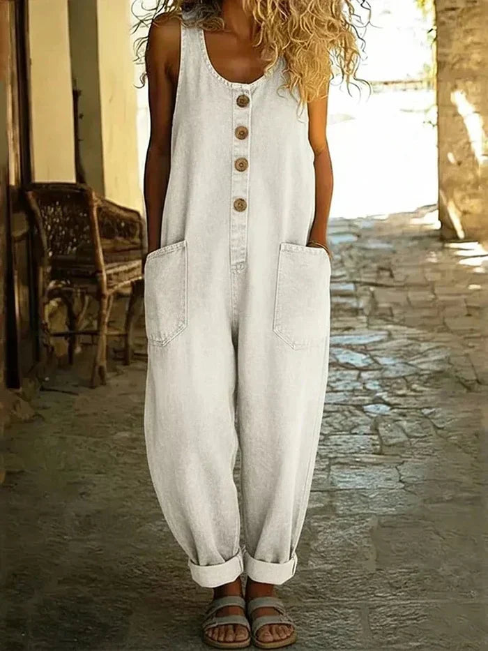 Trendy women's loose fit sleeveless overalls jumpsuit, offering a comfortable, casual, and vintage-style spring look.