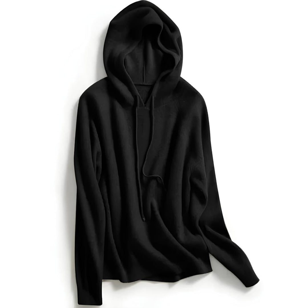 Woman enjoying a coffee, wearing a Women's Luxe Cashmere Blend Relaxed Hoodie