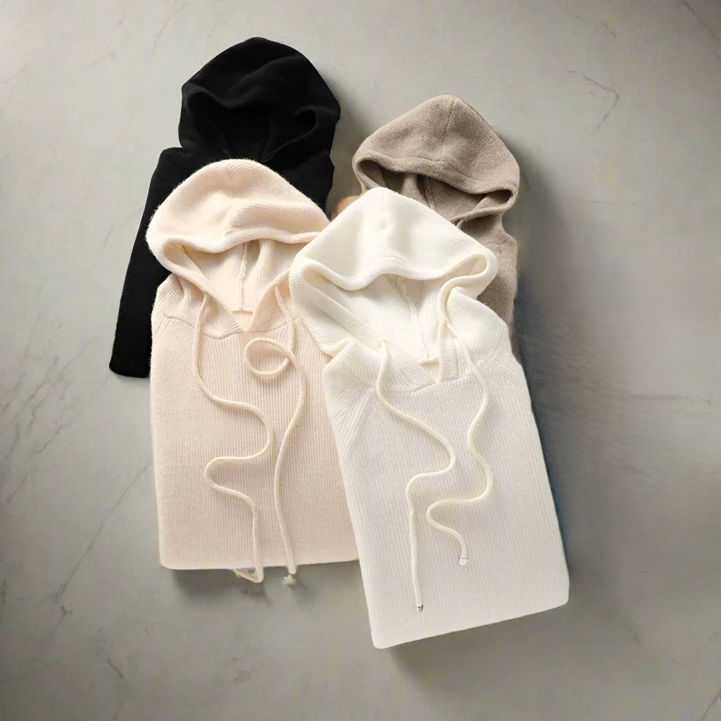 Model in a dynamic pose, highlighting the movement of the relaxed fit hoodie