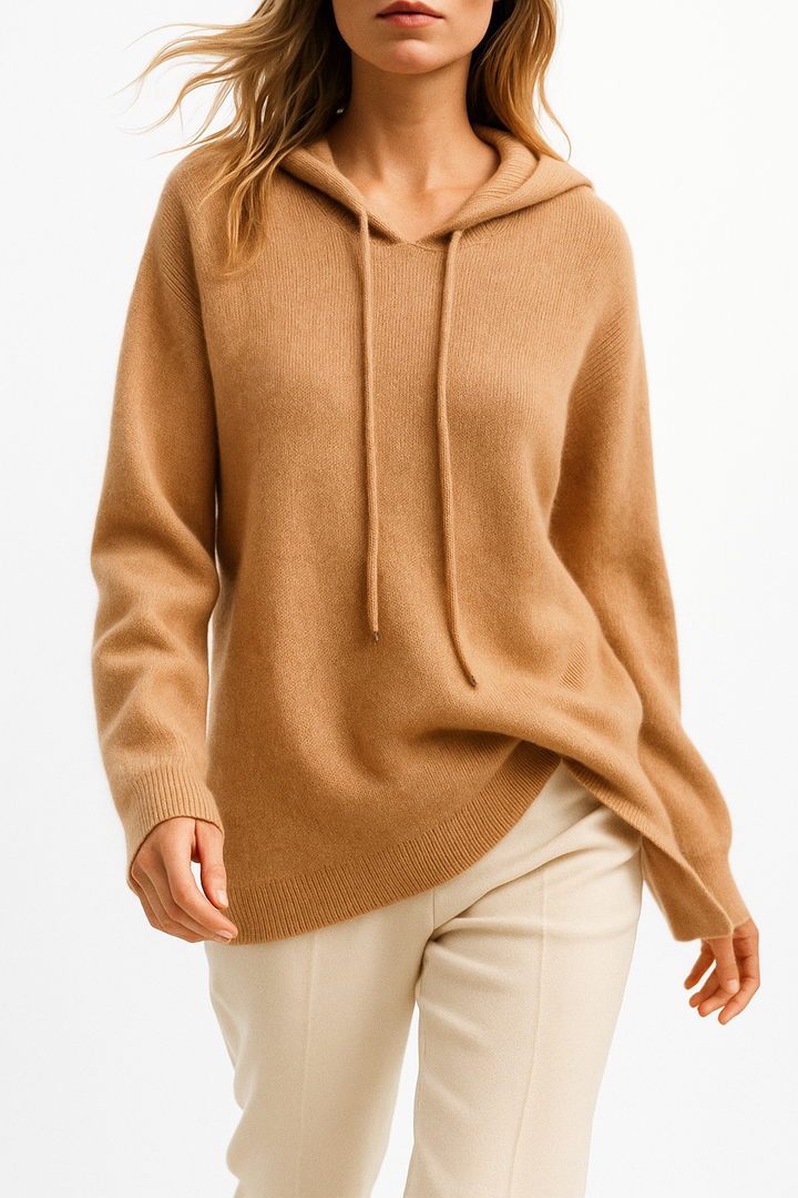 Woman wearing a Women's Luxe Cashmere Blend Relaxed Hoodie in a relaxed pose