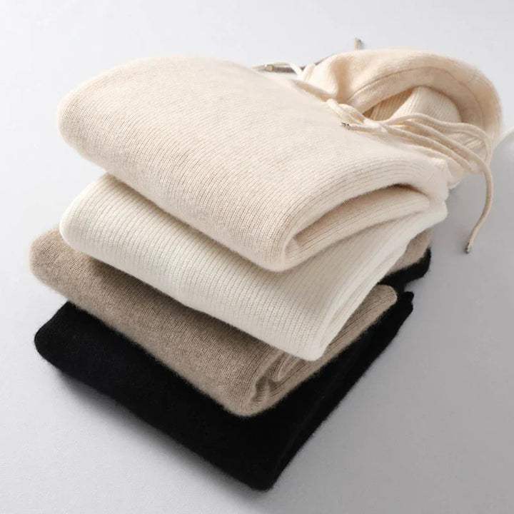 A close-up of the brand tag on the Women's Cashmere Blend Relaxed Hoodie