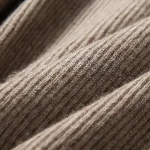 Model looking over shoulder, wearing the casual chic cashmere blend hoodie