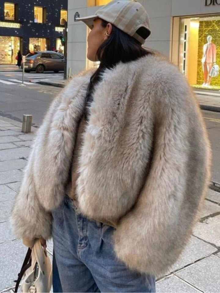 Luxury faux fur voluminous coat for women, warm and stylish winter jacket outerwear