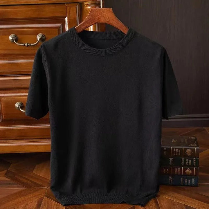 Premium knit cashmere tee for women. Soft, luxurious, long-sleeved crew neck top for casual style.