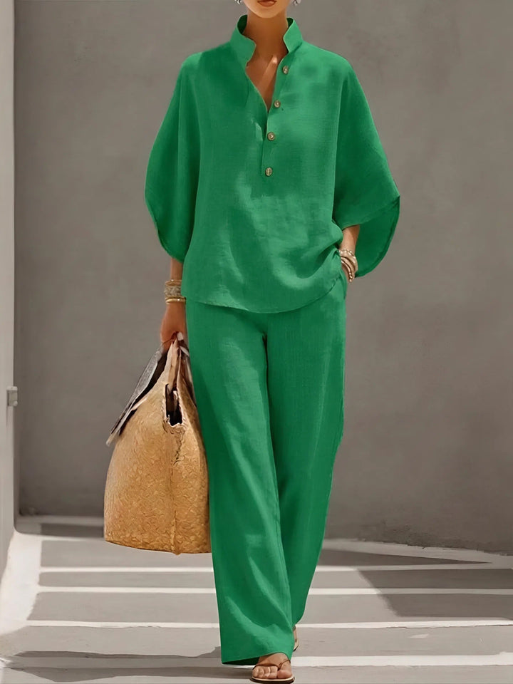 Elegant women's pant set with a chic Mandarin collar kimono sleeve top and comfortable wide-leg pants.
