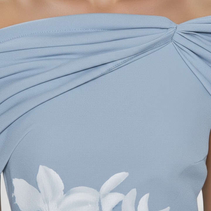 Elegant women's off-shoulder midi dress with vibrant floral print, ideal for special occasions.