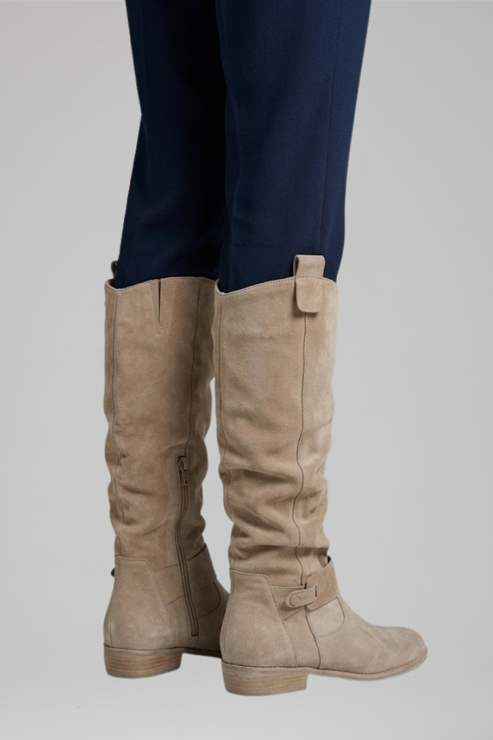 Fashionable women's orthopaedic knee boots, designed with side zipper for easy wear, great for winter comfort.