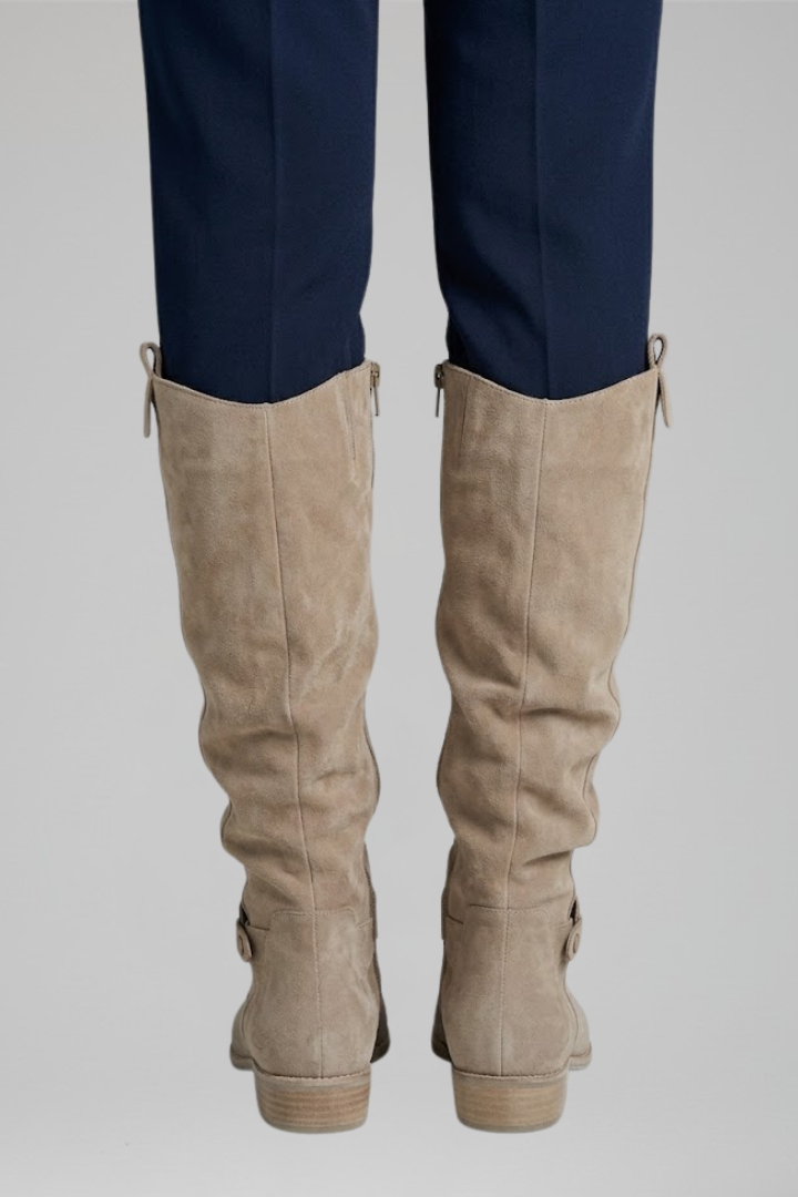 Elegant women's orthopaedic knee-high boots with side zipper, providing comfort and support for everyday fashion.