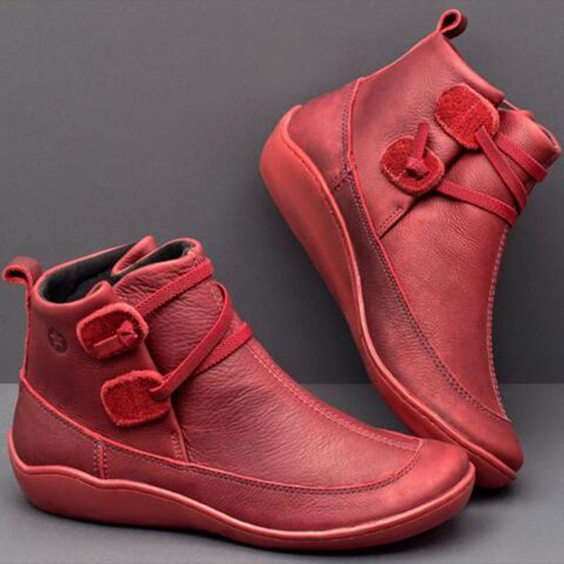 Women's orthopedic ankle boots with stylish button detail for comfort & support. Wide toe box design.