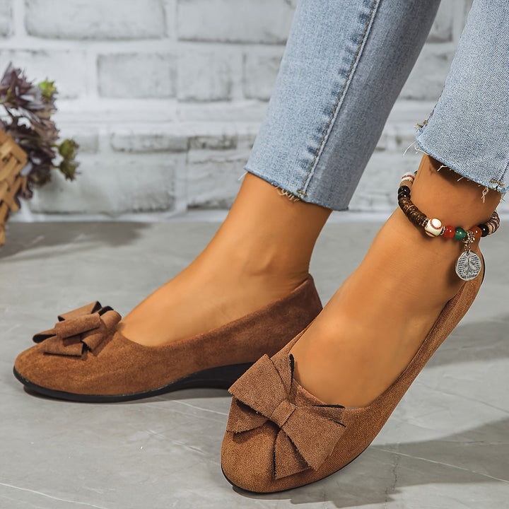 Women's slip-on orthopedic walking flats, designed for maximum comfort & support.