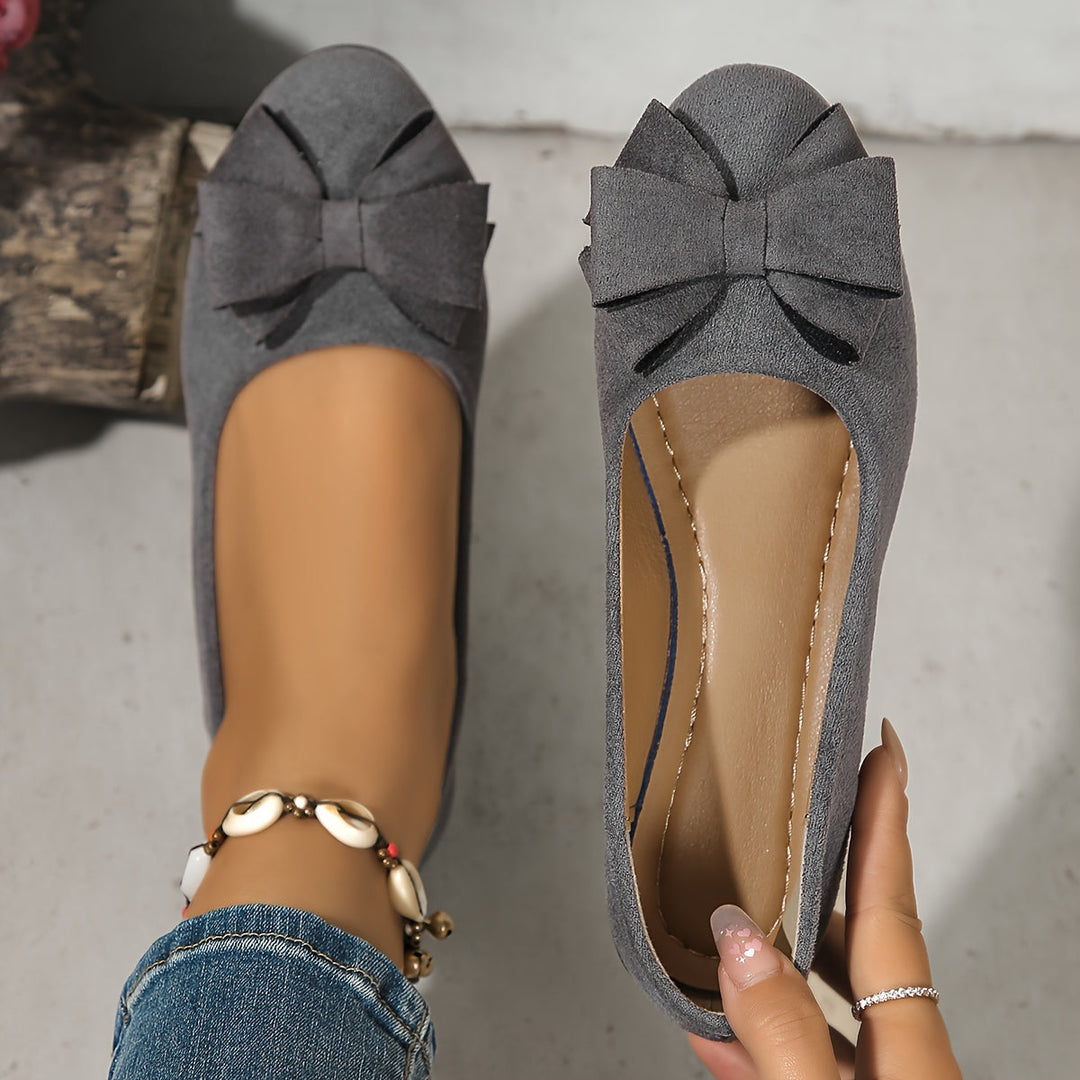 Women's orthopedic flats with bow detail, ensuring all-day comfort & foot health.