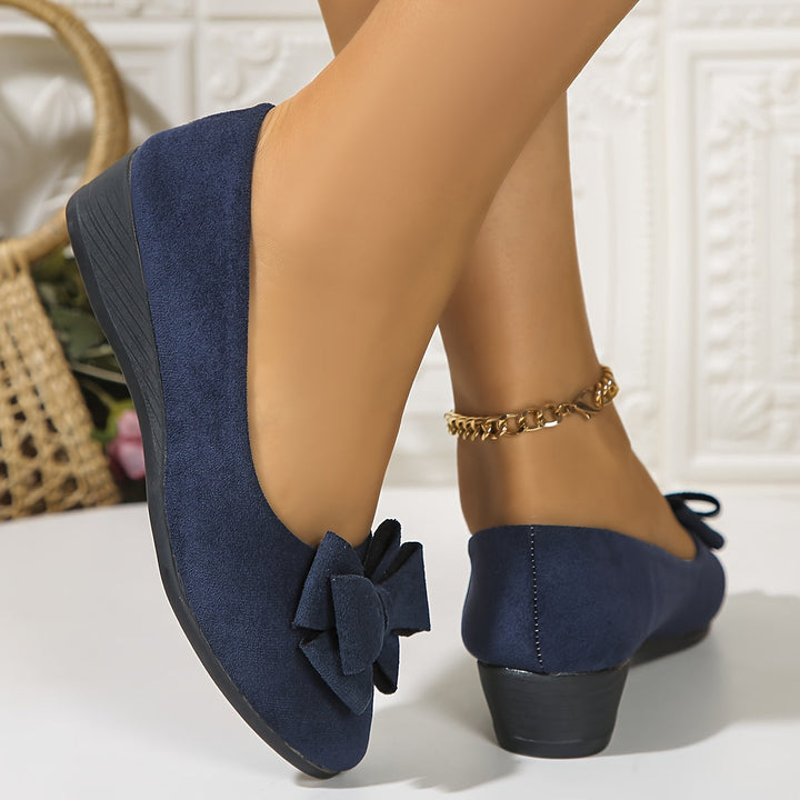 Slip-on women's comfort flats, orthopedic design with elegant bow & arch support.