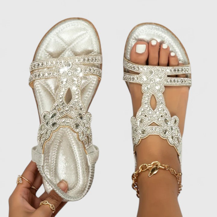 Stylish women's slip-on sandals, designed with ergonomic arch support for all-day comfort & casual wear.