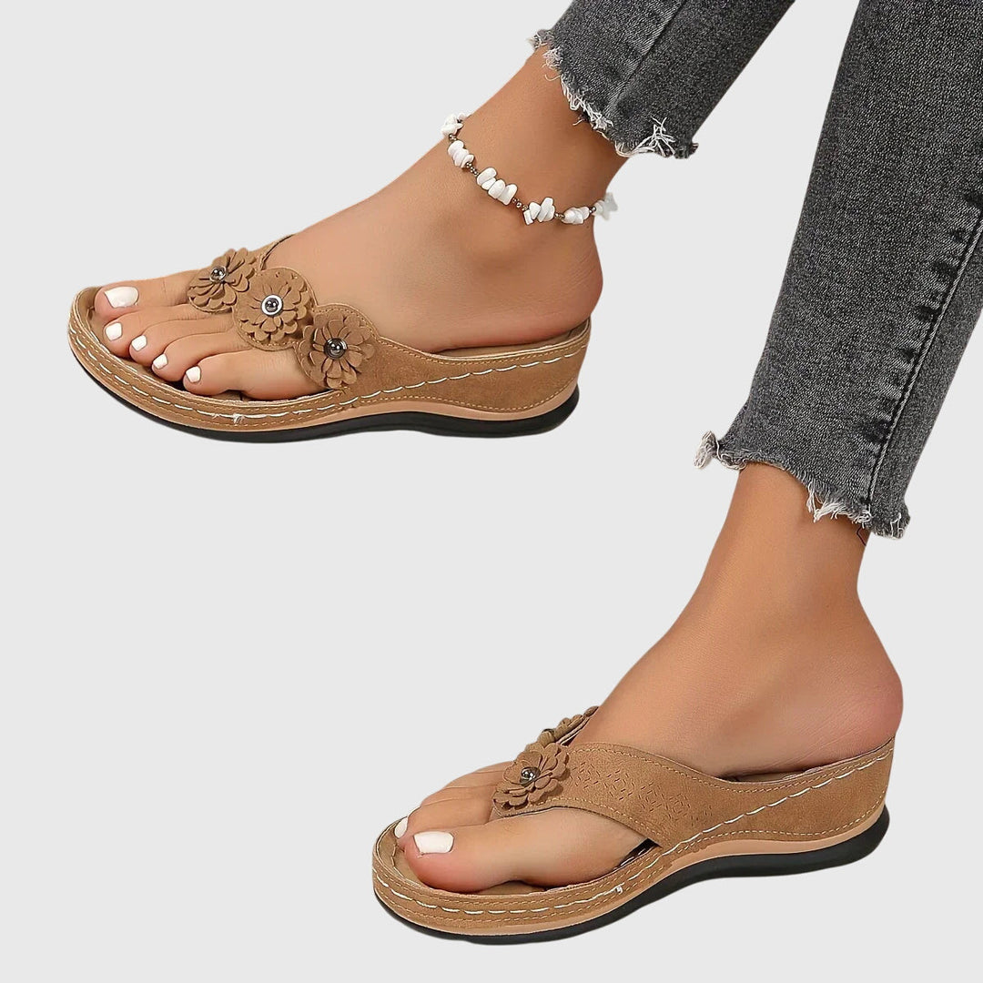 Sleek women's orthopedic flip flops, providing excellent arch support & comfort.